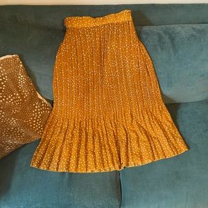 Yellow polka dotted skirt